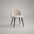 Chaise de salle à manger rembourrée en polyester texturé et acier noir, dossier arrondi beige, 52 × 57 × 82 cm
