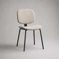 Chaise de salle à manger rembourrée en polyester bouclé et acier, écru et noir, 50 × 55 × 83 cm